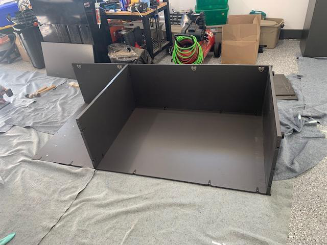 Cabinet assembly setup on blankets with furring strips