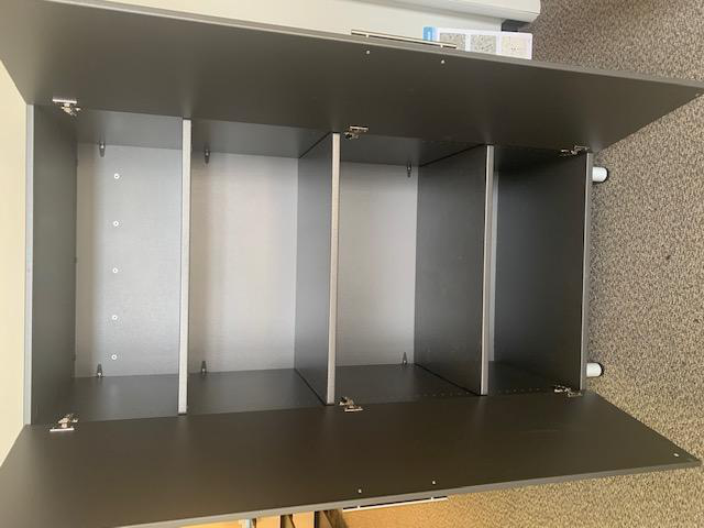 Completed cabinet interior with multiple shelves