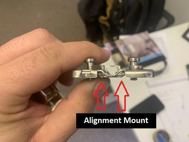 Hinge alignment mount detail